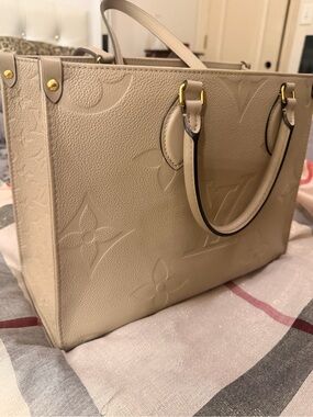 Louis Vuitton Cream Embossed Monogram Leather Tote